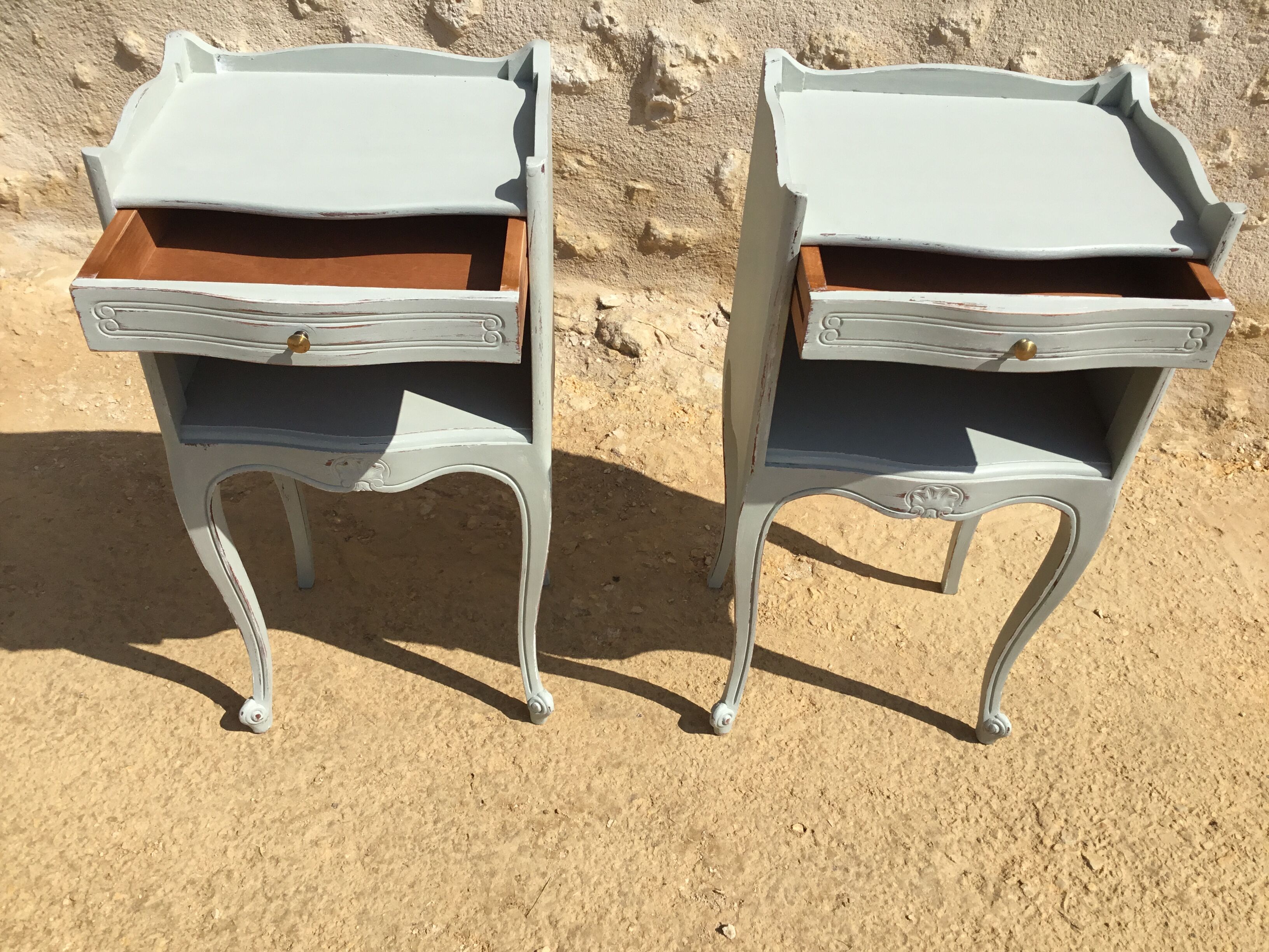 Pair of patinated Louis XV style bedside tables