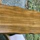 Pair of brutalist benches in solid blond elm by Aranjou, France, 1970s