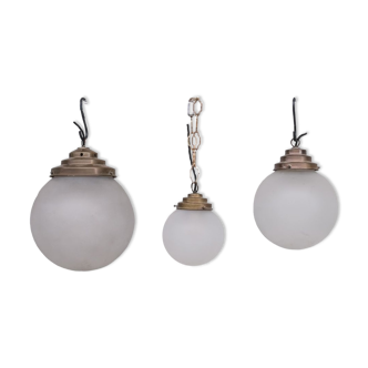 Trio of Opaque Glass and Brass Pendant Lights