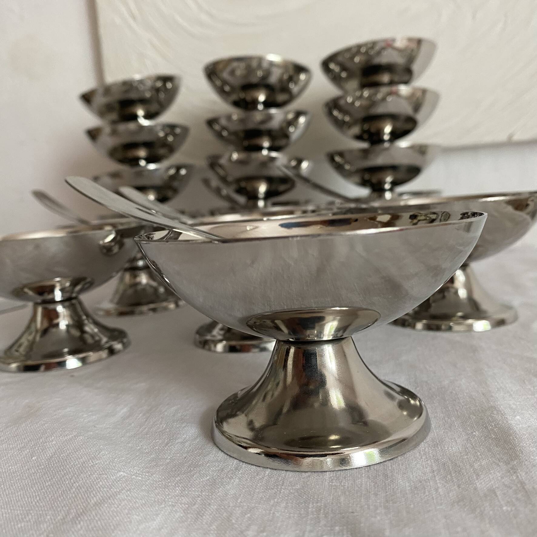 Stainless steel ice cream cups and spoons, 1960s-70s, original boxes.
