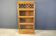 Four tier oak barrister style bookcase with leaded glass