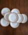 Lot of 8 small porcelain bread plates.