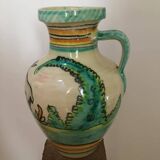 Ceramic pitcher signed Del Mazo representing doe and deer in the vegetation