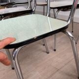 10 mismatched multicolored Formica chairs 60s