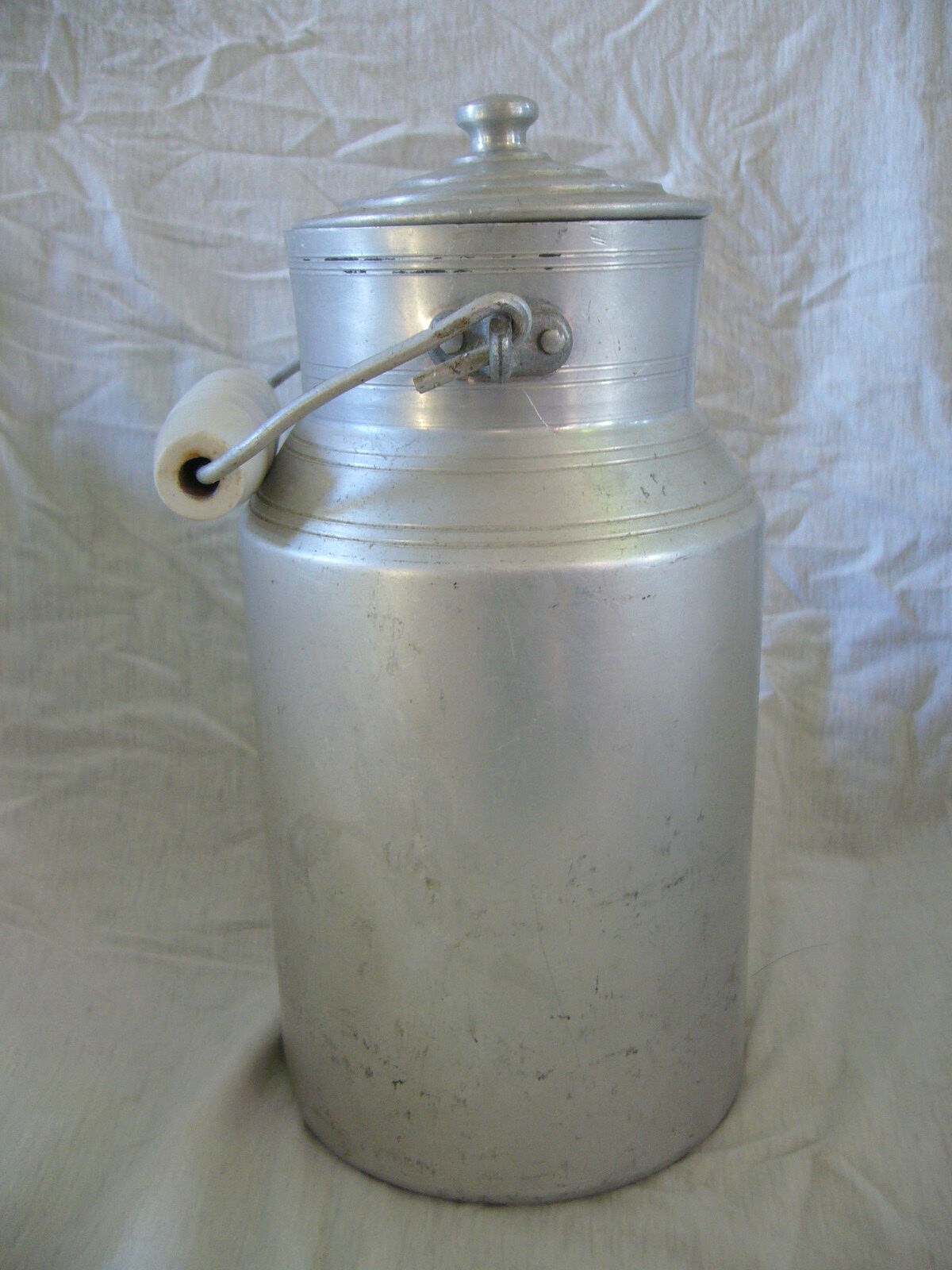 Old aluminum milk pot