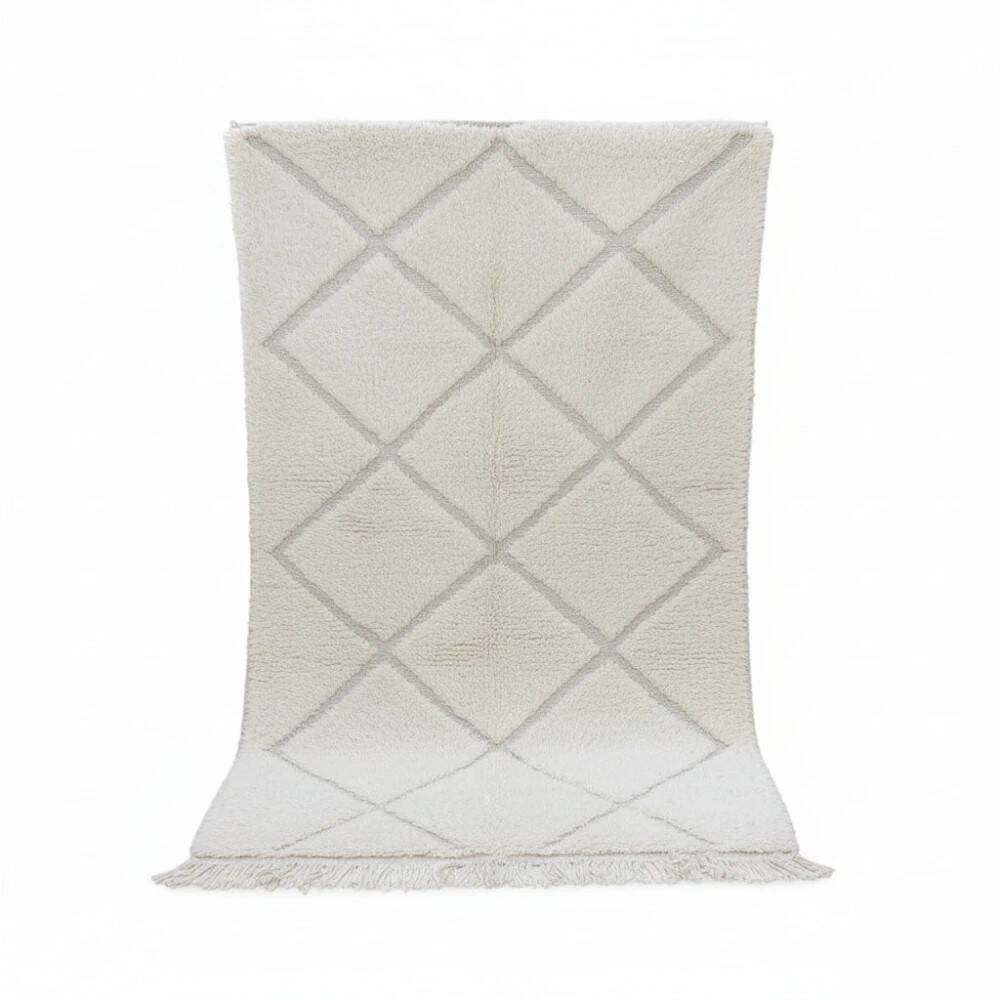Small white Moroccan rug with diamond patterns
