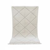 Small white Moroccan rug with diamond patterns