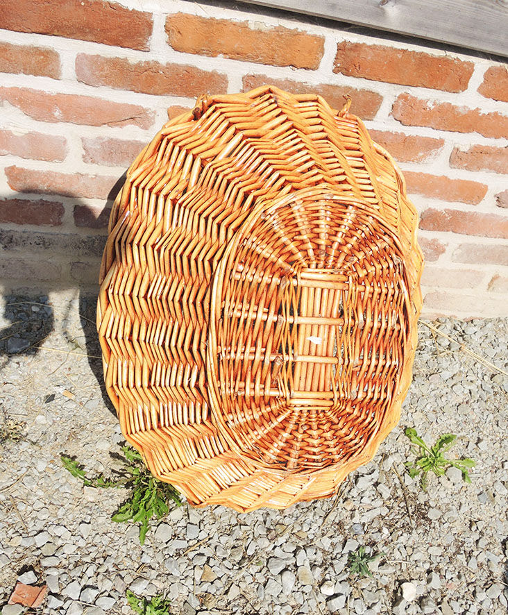 Old oval wicker linen basket, light rattan