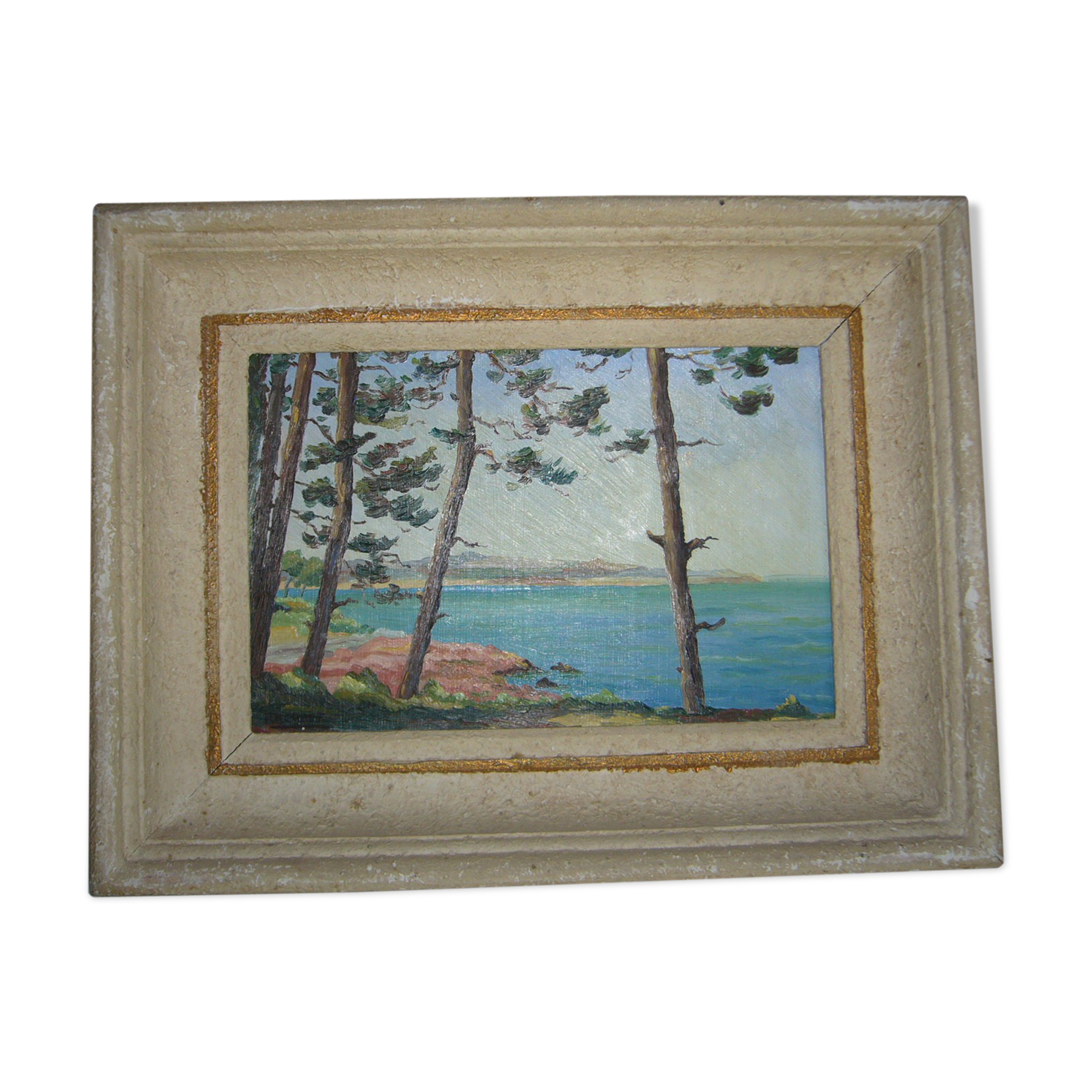 Old framed oil-painted painting depicting a seaside