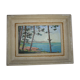Old framed oil-painted painting depicting a seaside
