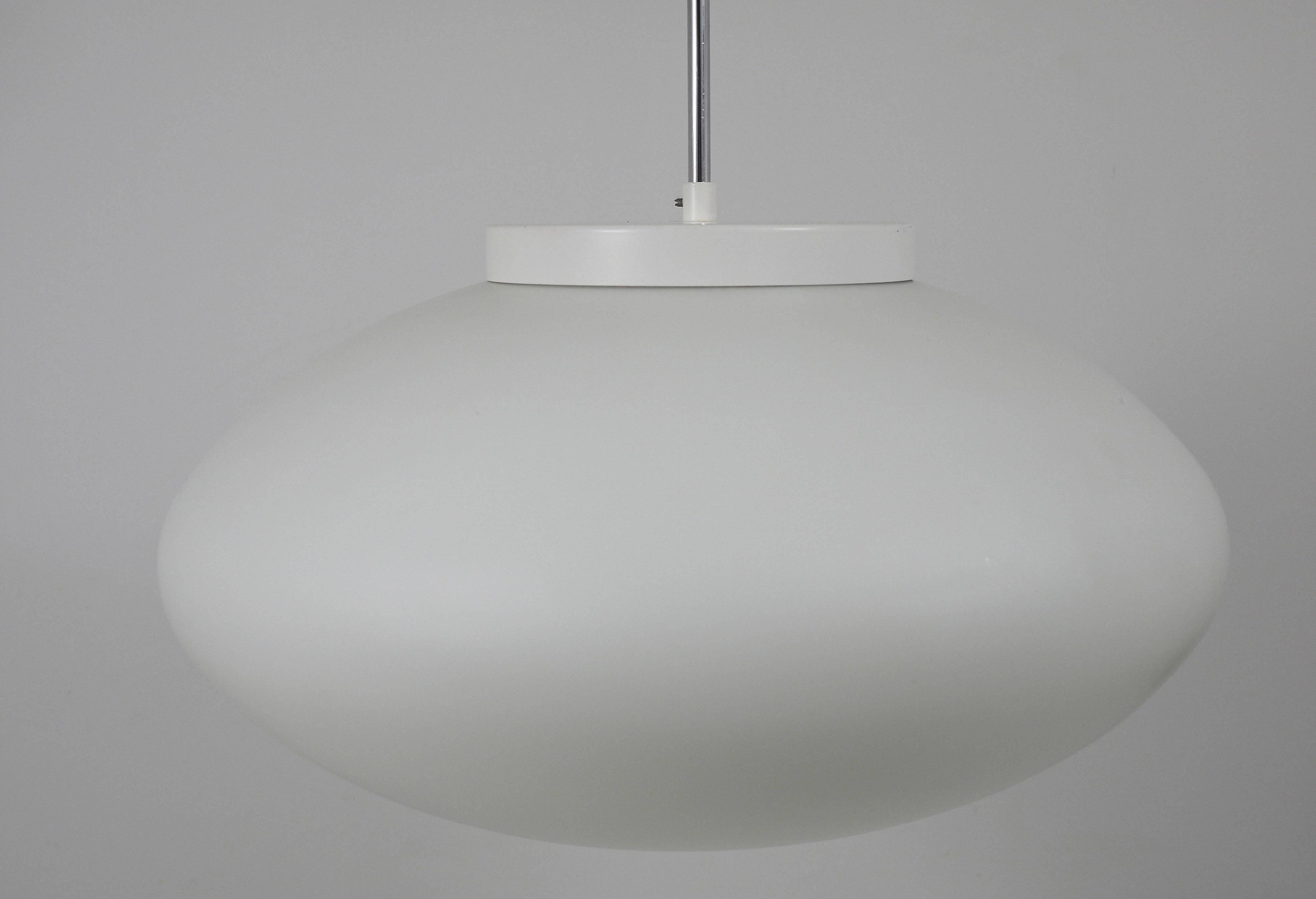 Up to 40 huge elliptical opaline glass pendants, in the style of Lisa Johansson-Pape.