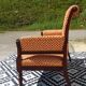 Old bench in wood and orange velvet