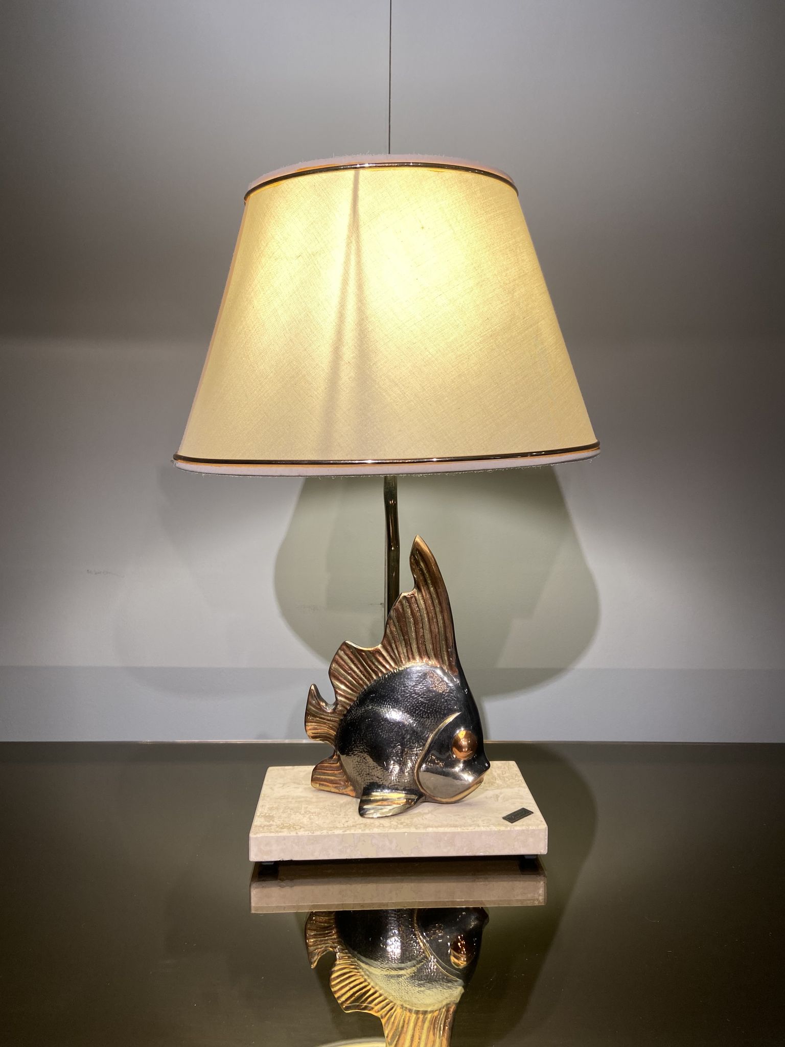 Vintage fish lamp in gold and copper metal