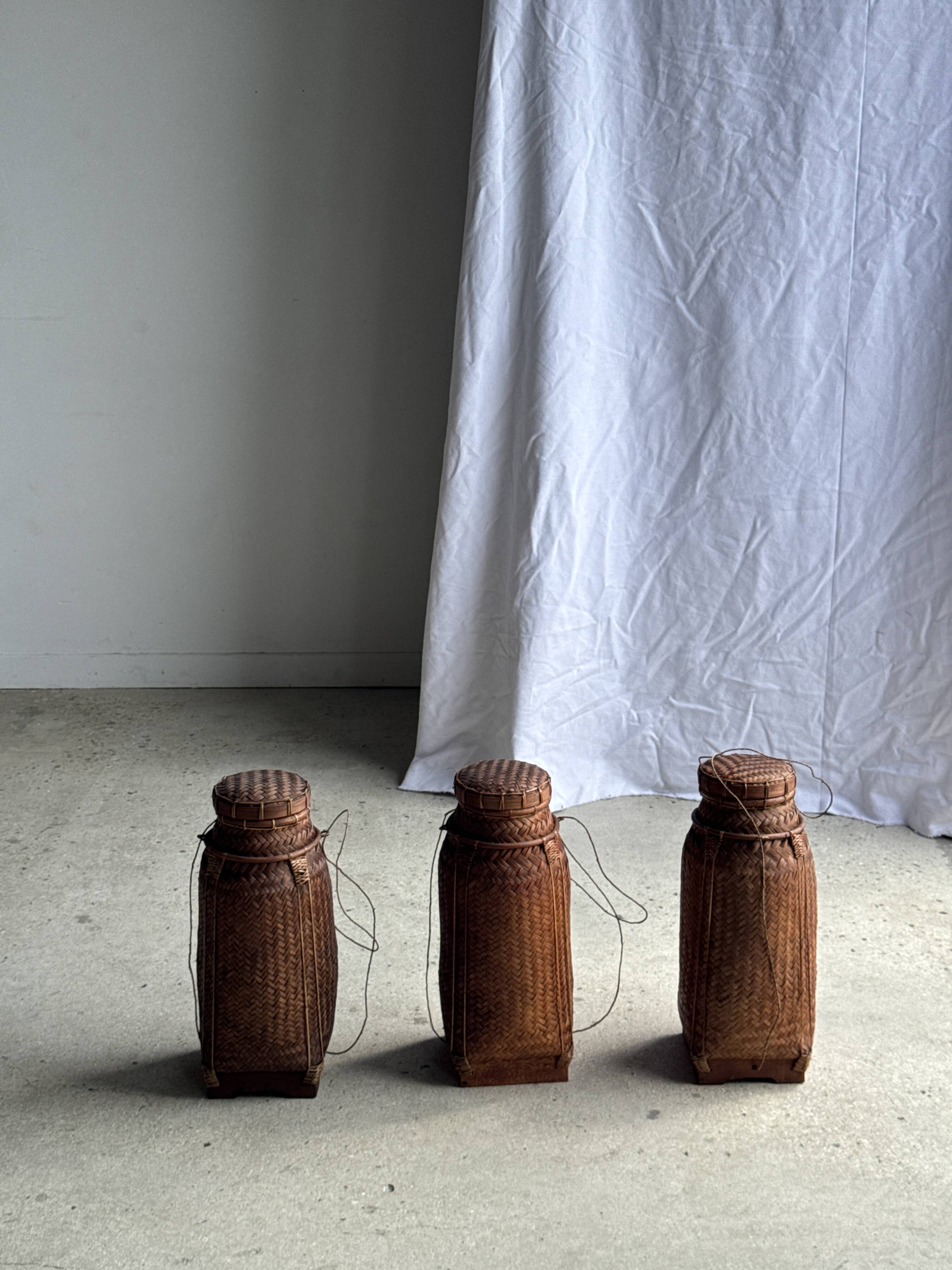 Small traditional Balinese basket with cords H47 D19 0.5kg