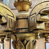 Golden wooden chandelier with crystal pendants from the 19th century.