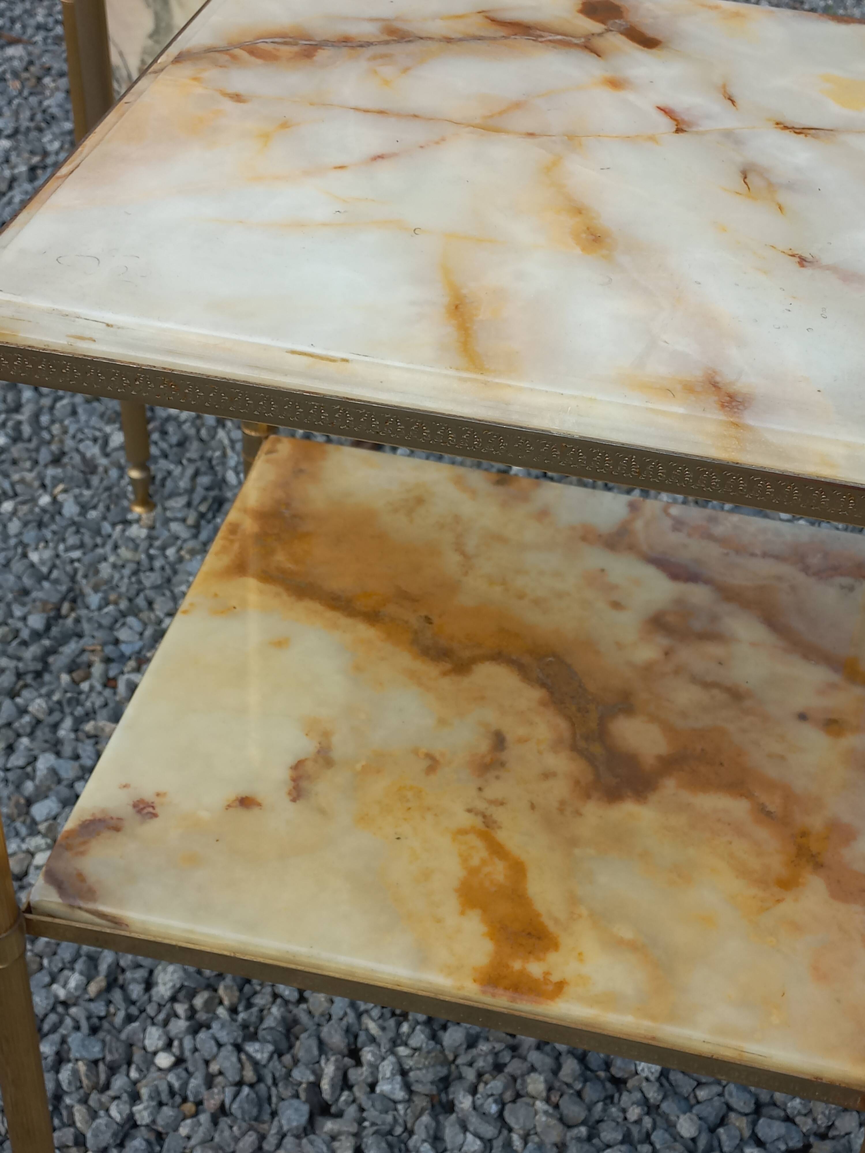 Pair of neoclassical side tables in bronze, brass, marble, and o.