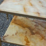 Pair of neoclassical side tables in bronze, brass, marble, and o.