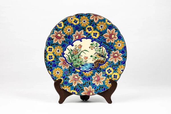 Assiette Longwy 1930 – Émaux à décor d’oiseaux et fleurs oranges