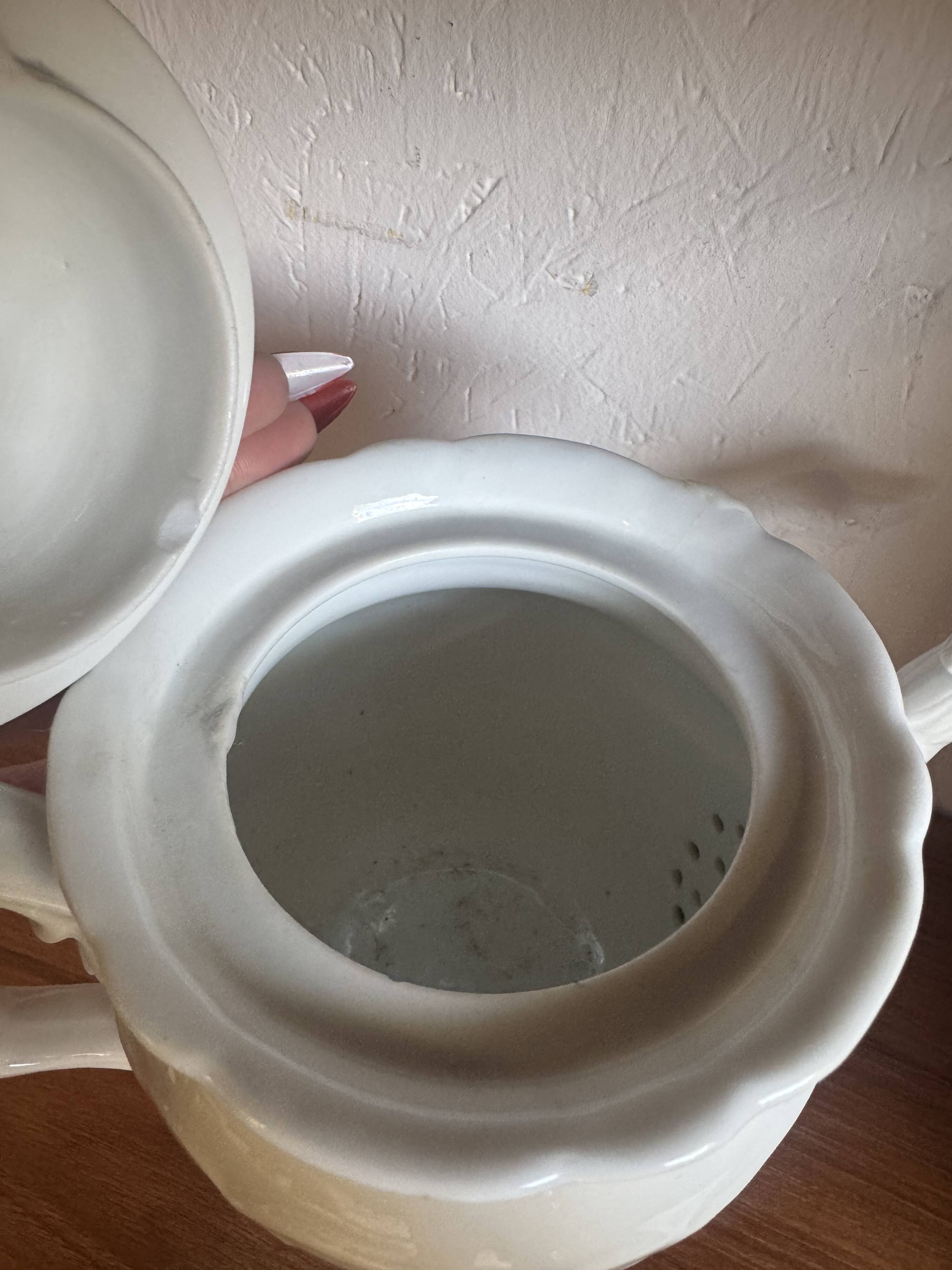 White ceramic teapot