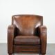 Characterful vintage sheepskin leather armchair with beautiful colours