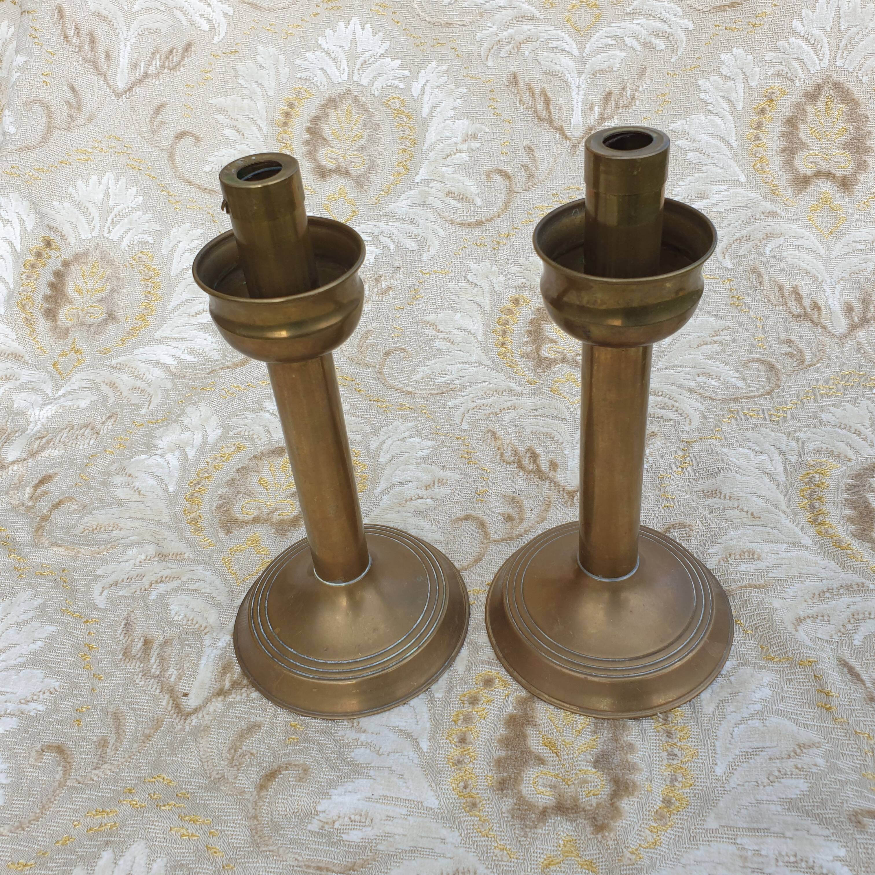 Pair of old brass candlesticks