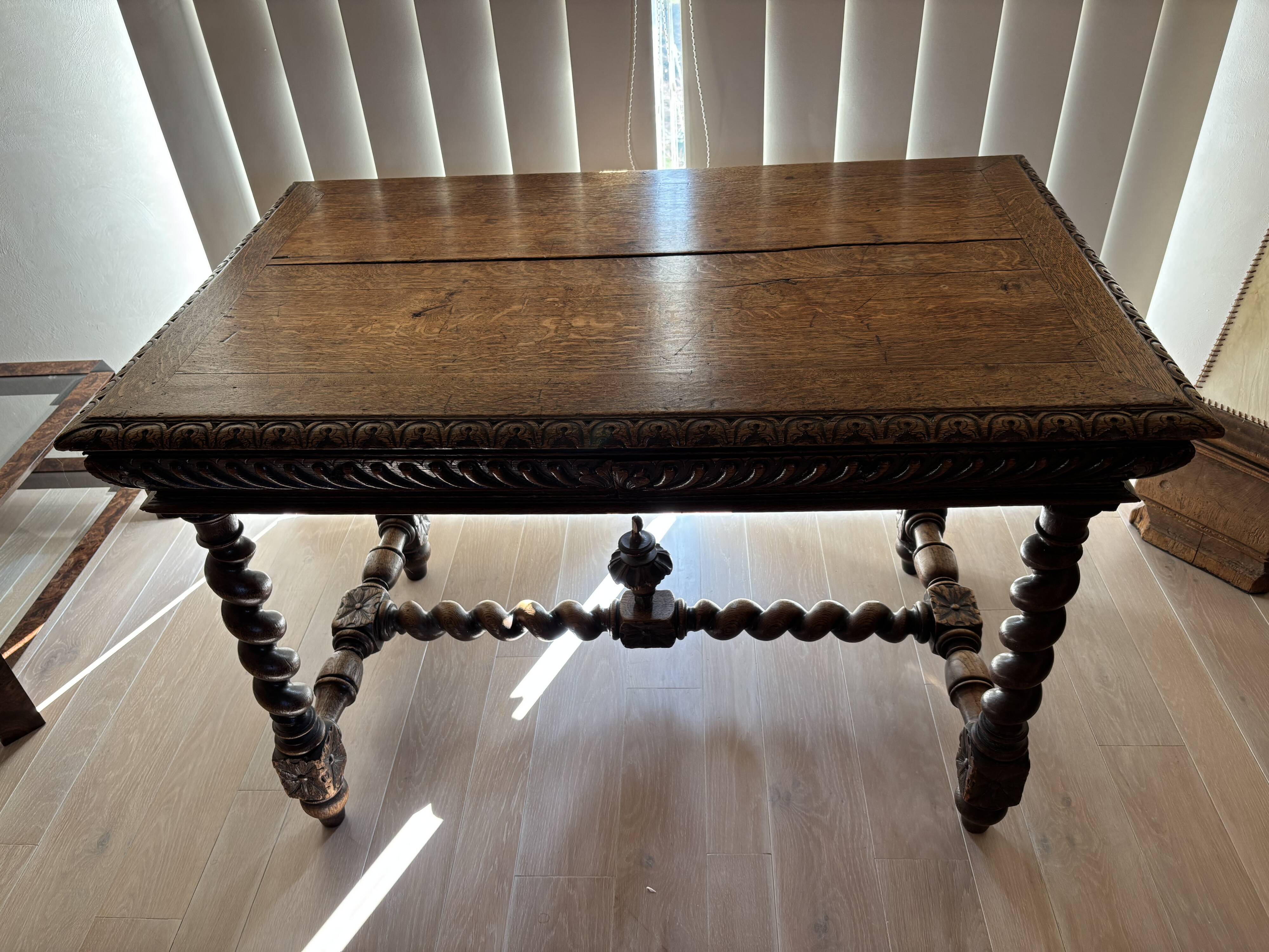 Louis XIII style desk in carved solid oak with twisted legs, late 19th century.