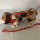 Fisher price wooden shooting dog 1961