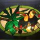 Art Deco style stained glass window representing a couple of toucans