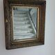 Antique mirror in wood and gilded stucco