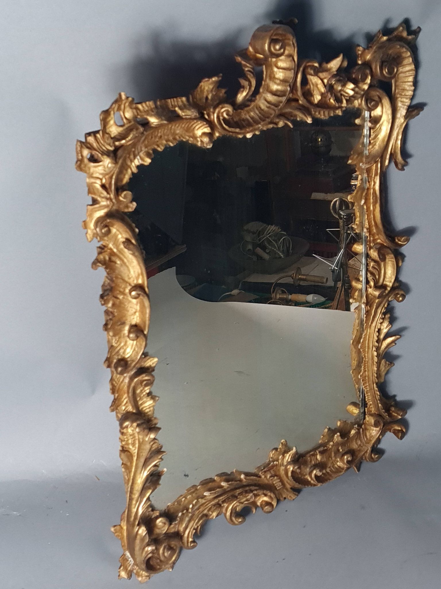 Mirror circa 1800, carved and gilded wooden frame, rocaille decoration, 54x39 cm, C227