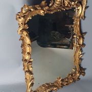 Mirror circa 1800, carved and gilded wooden frame, rocaille decoration, 54x39 cm, C227