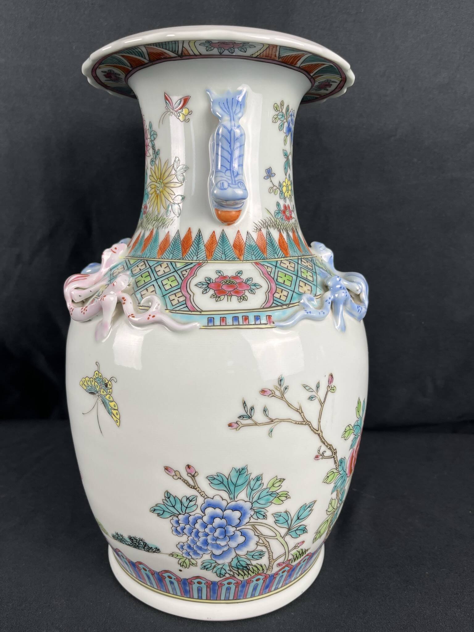 China, polychrome porcelain vase with relief decoration, 20th century