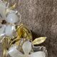 Pair of vintage golden sconces and lucite flowers