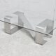Coffee table with "kinetic" steel base and glass slab. Circa 1970.