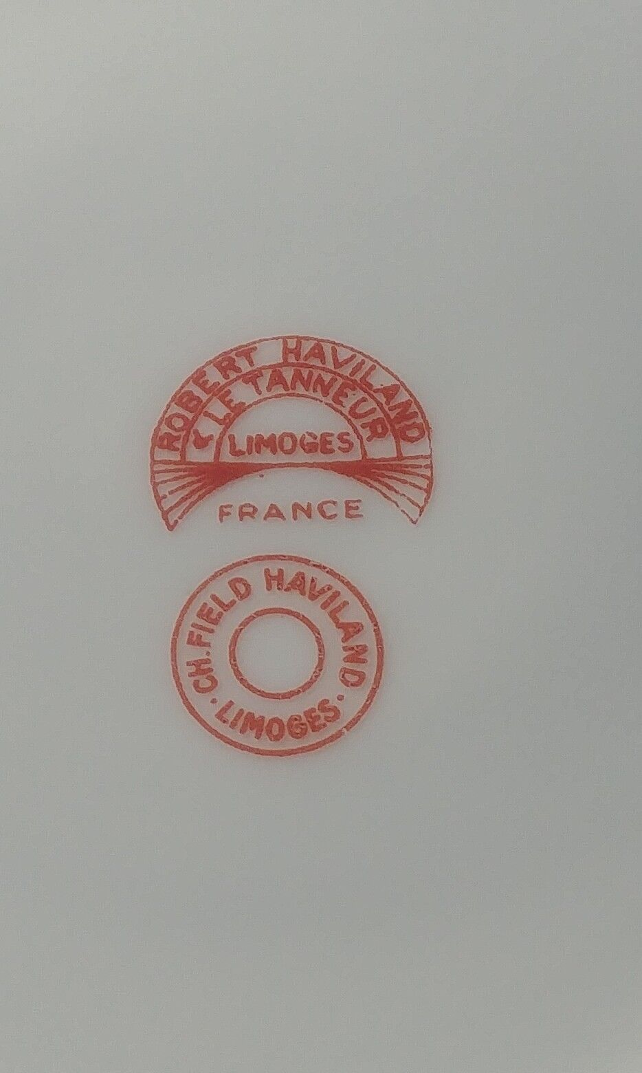 Set of four hollow Limoges porcelain plates signed Robert Haviland & Le Tanneur