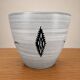 Milet cache-pot Sèvres, hand-decorated with a kneeling woman, 1950s.