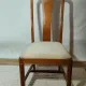Set of 4 vintage chairs in stained wood and cream fabric.