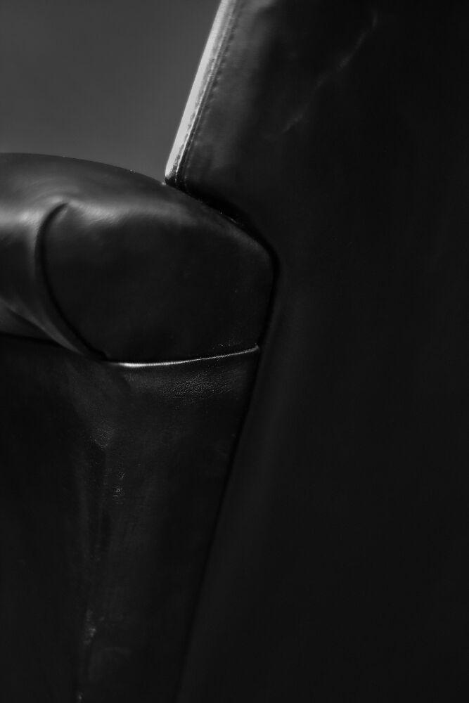 Mid-century danish modern minimalist black leather swivel armchair by georg thams, 1960s