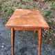 Vintage so-called portfolio table with oak compass base and its oak cp swivel top.