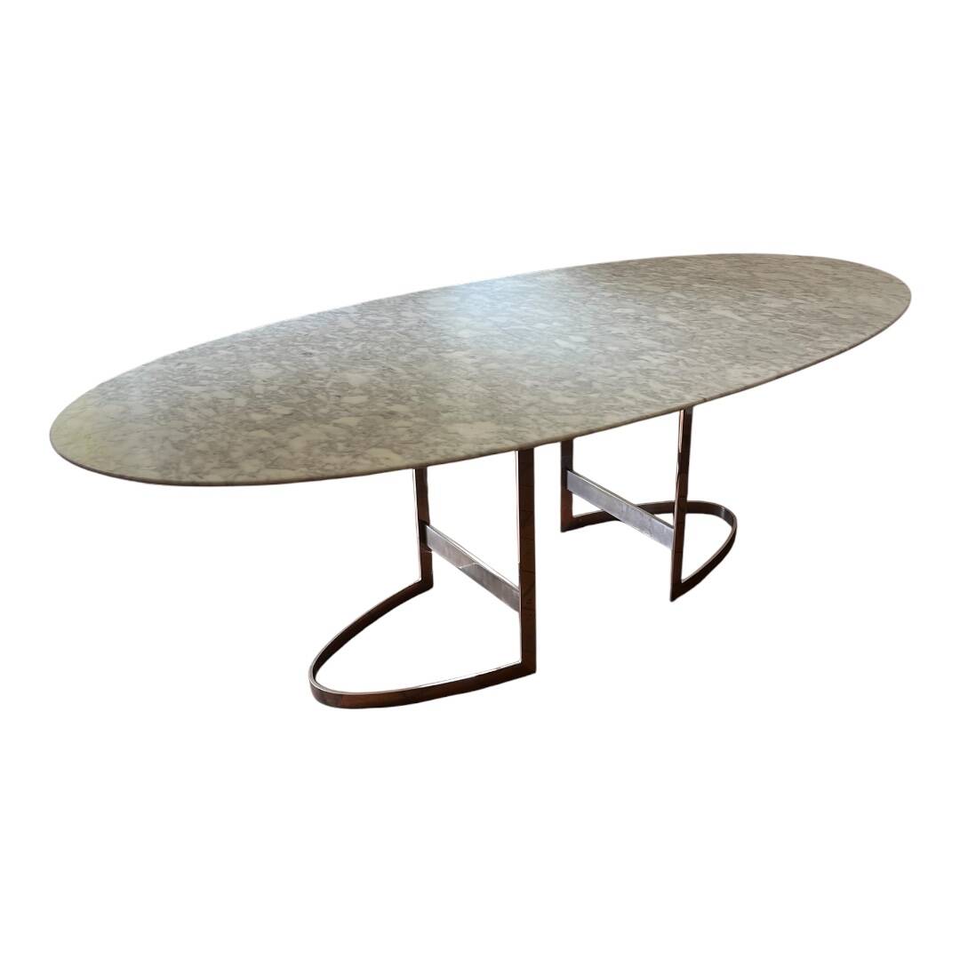 Oval table designed by Vittorio Introini, published by the Fratelli house.