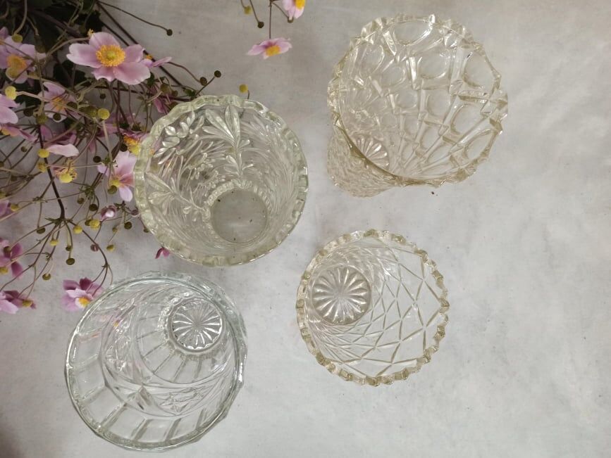 Four bohemian crystal vases