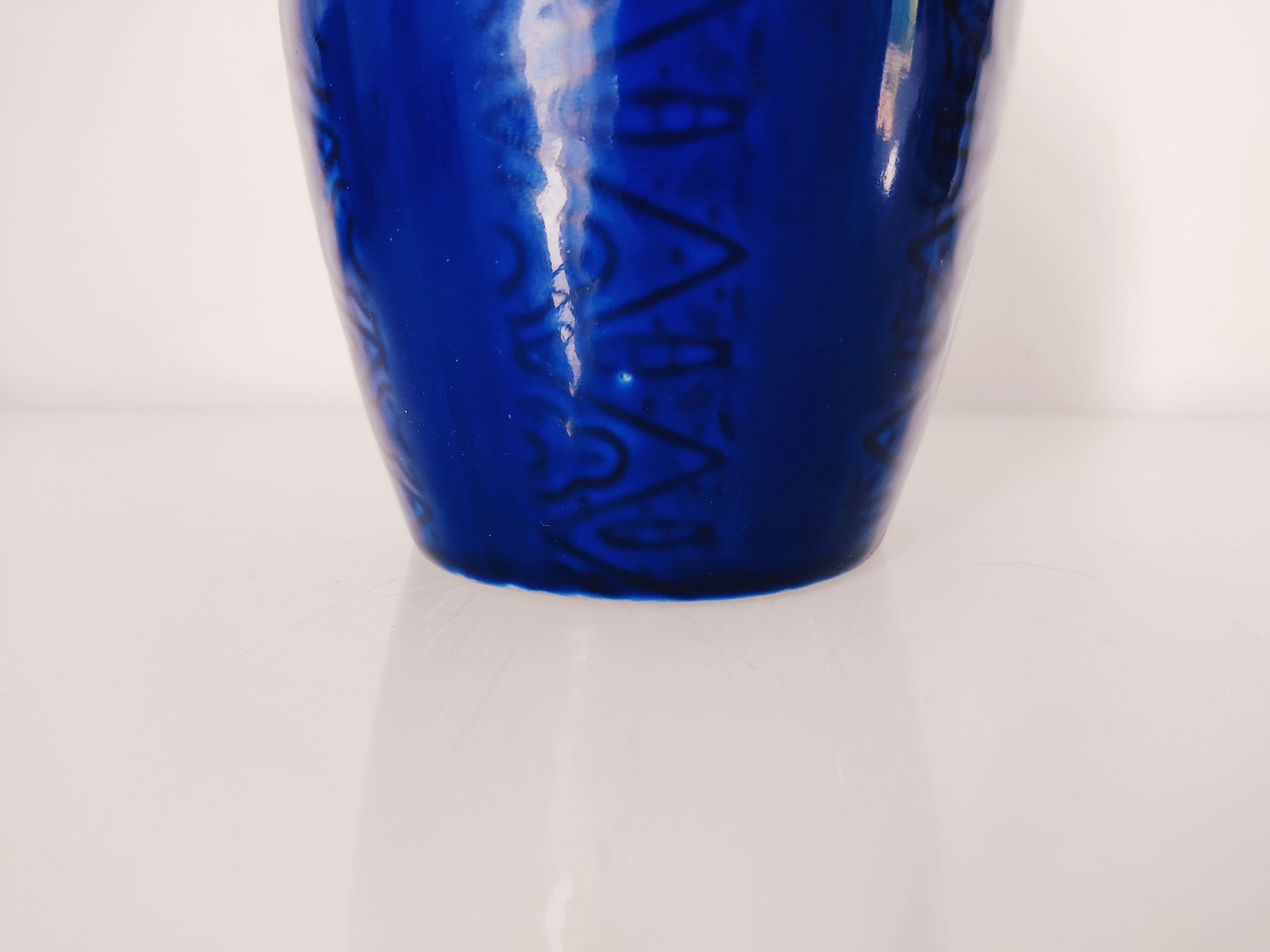 Blue vase geometric incised decoration