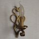 French vintage brass handmade single wall light with scrolled open backplate.