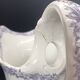 Large antique toilet bowl by Jules Vieillard Bordeaux with violet floral decoration.