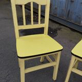 Pair of wooden and yellow formica chairs