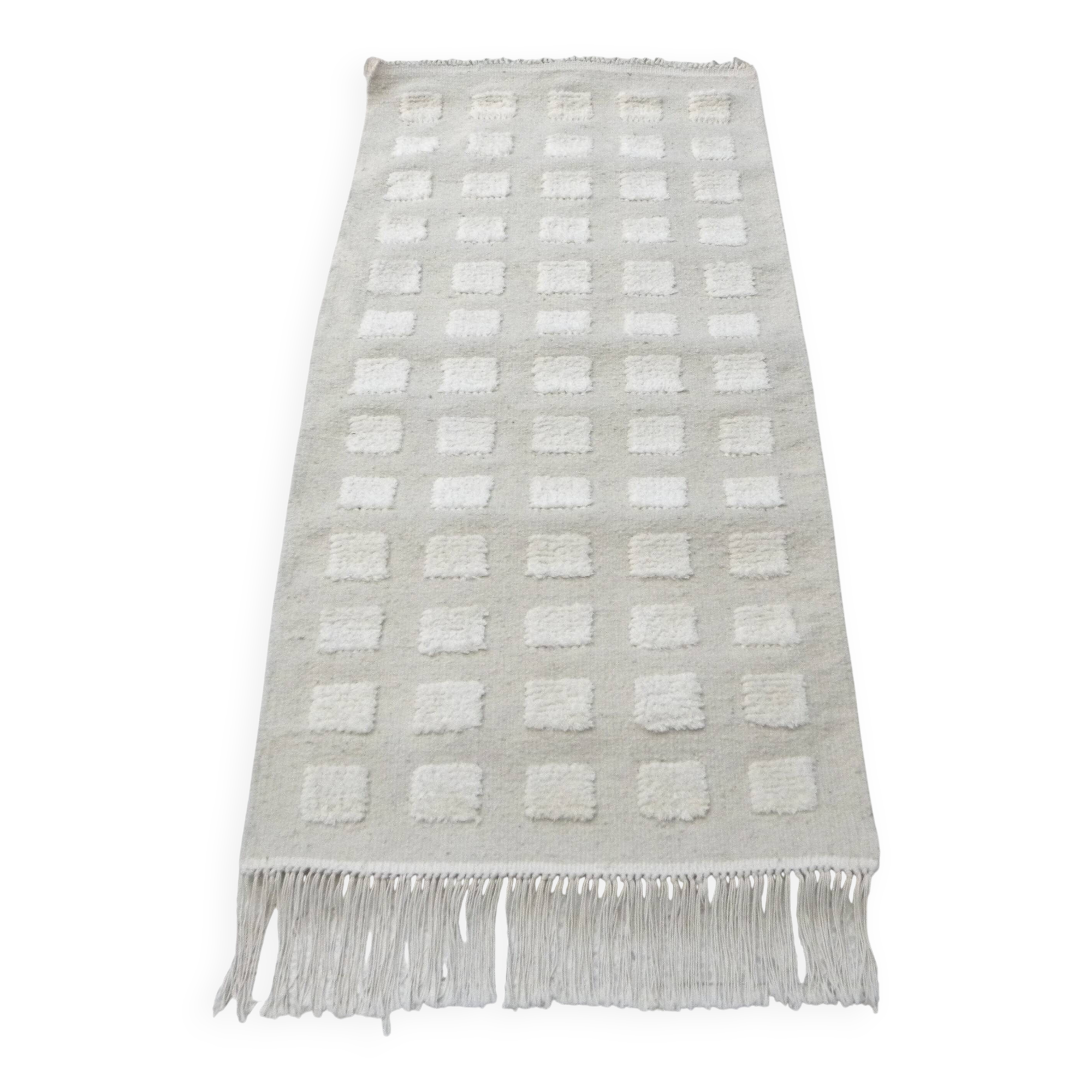 Tunisian Berber rug handwoven from pure sheep wool.