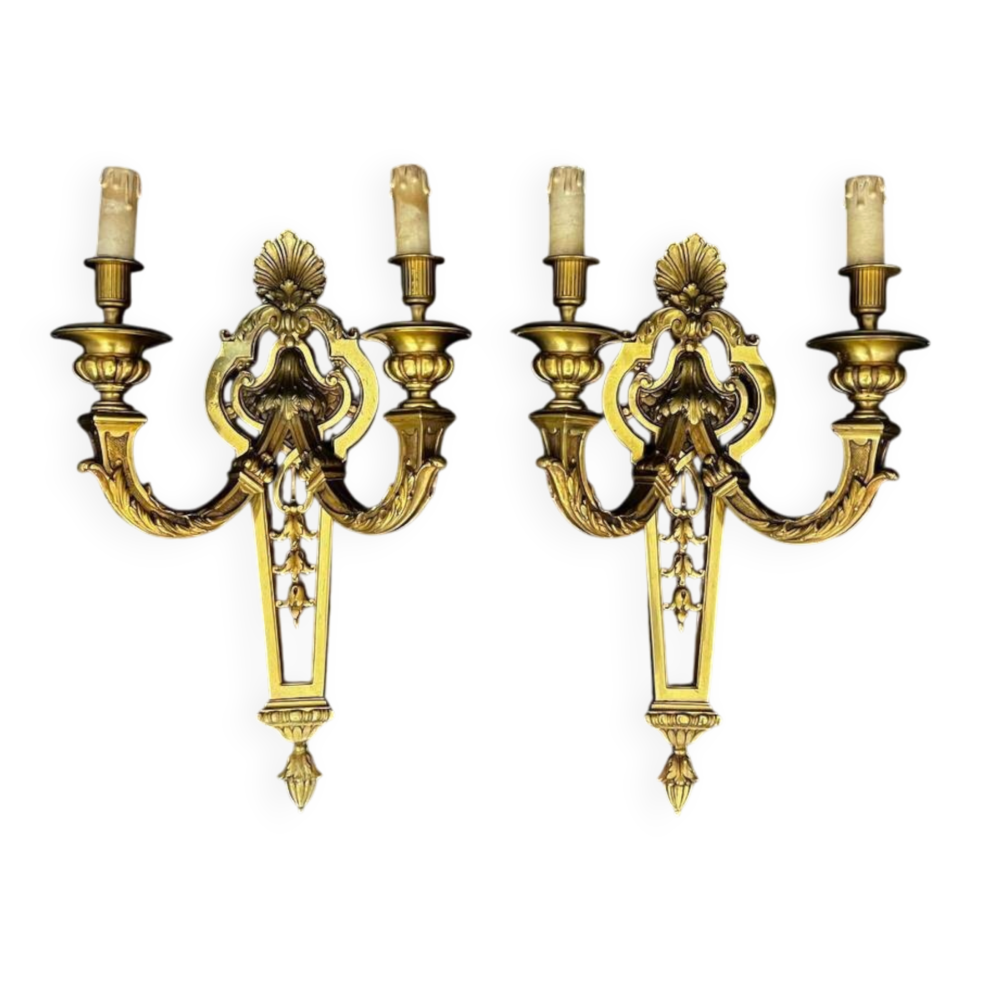 Large pair of gilt bronze wall sconces in the Louis XVI style.