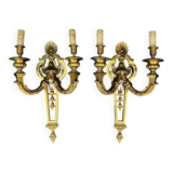 Large pair of gilt bronze wall sconces in the Louis XVI style.