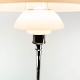 Chrome floor lamp with white lampshade