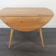 Table à manger ronde avec rallonges pliantes Ercol, années 1960
